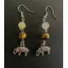 Boucles d’oreilles Oeil de Tigre & Quartz Rutile avec un éléphant.